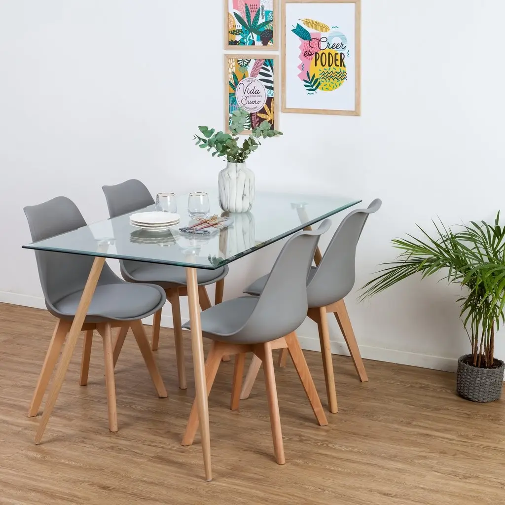 mesa tulip vidrio - Qué estilo es la mesa tulip